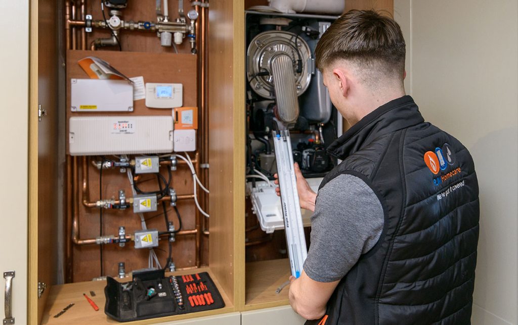 RJ Martindale gas safe registered engineer conducting works on homeowners boiler.