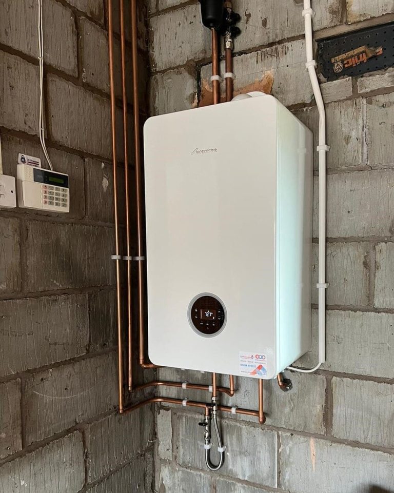 Worcester 8000 boiler installation in a garage by RJ Martindale's engineers