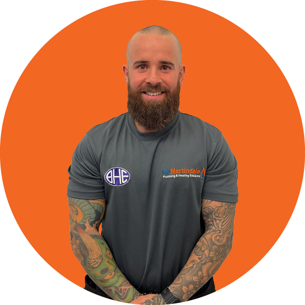 Half body photograph of Dylan, part of the RJ Martindale team.