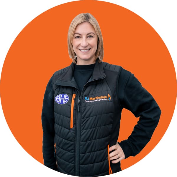 Half body photograph of Louise, part of the RJ Martindale team.