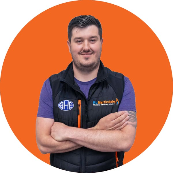 Half body photograph of Connor, part of the RJ Martindale team.