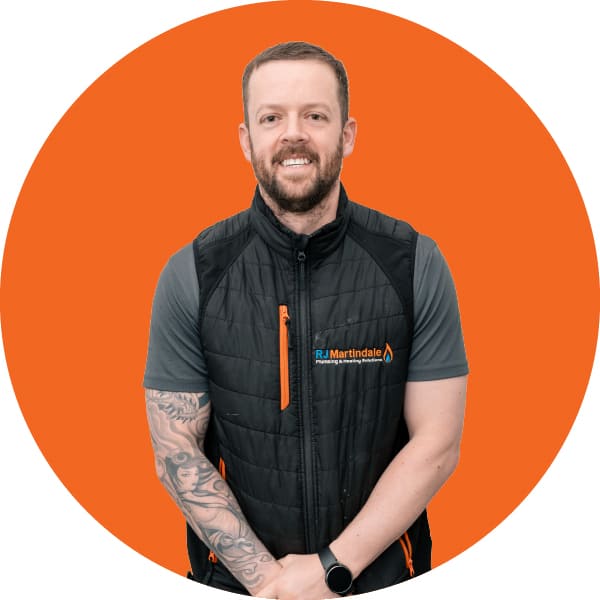 Half body photograph of Luke, part of the RJ Martindale team.