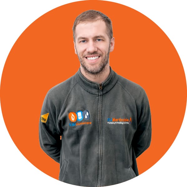 Half body photograph of Scott, part of the RJ Martindale team.