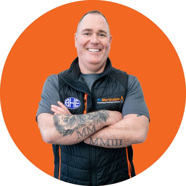 Half body photograph of Warren, part of the RJ Martindale team.