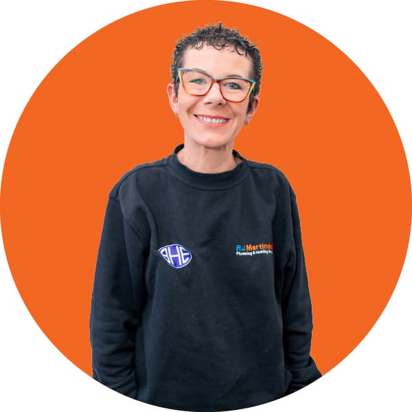 Half body photograph of Sue, part of the RJ Martindale team.