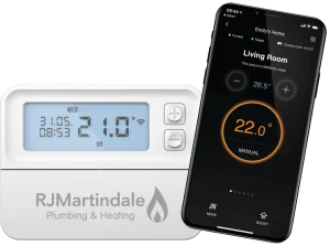 EPH smart thermostat with the RJ Martindale logo, next to a mobile phone with the EMBER app open on the screen